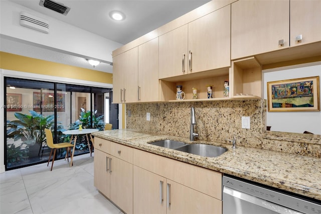 kitchen featuring visible vents, light brown cabinetry, a sink, dishwasher, and marble finish floor