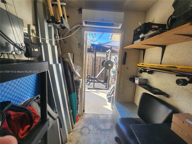 utility room with a wall unit AC