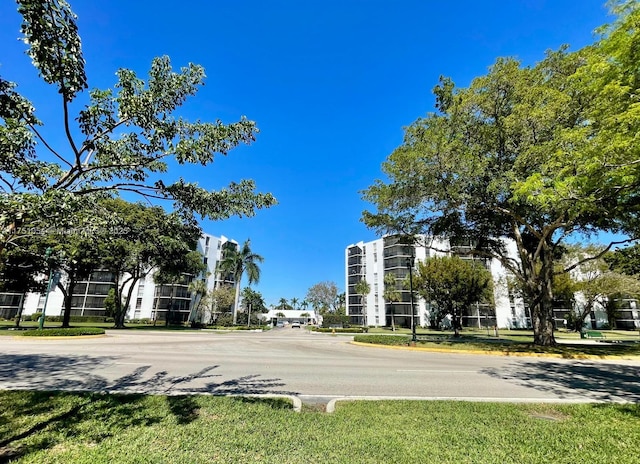 view of road featuring curbs