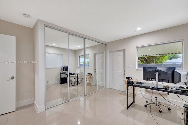 home office featuring recessed lighting and baseboards