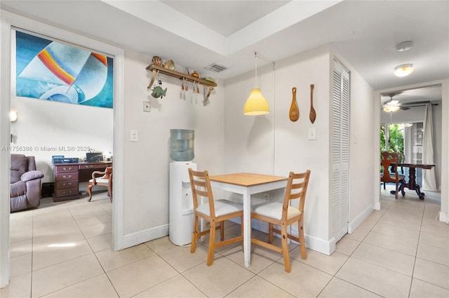 dining area with visible vents, baseboards, and light tile patterned flooring