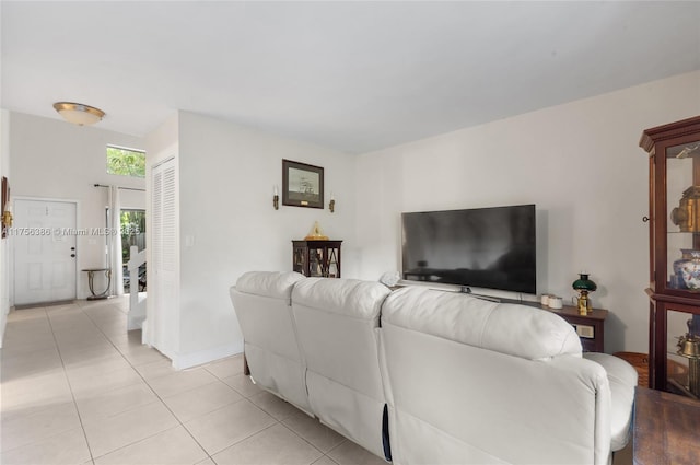 living room featuring light tile patterned floors