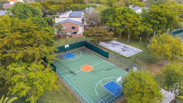 view of sport court with community basketball court and fence