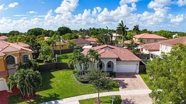 birds eye view of property with a residential view