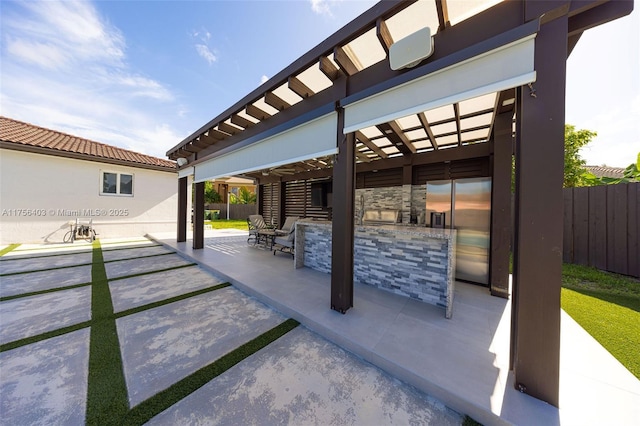 view of patio / terrace with fence