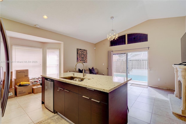 kitchen with dishwasher, vaulted ceiling, a sink, and a healthy amount of sunlight