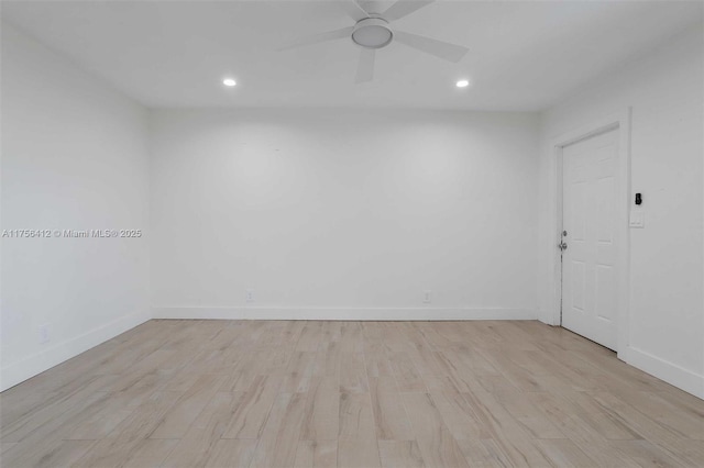 spare room with light wood-style flooring, baseboards, ceiling fan, and recessed lighting