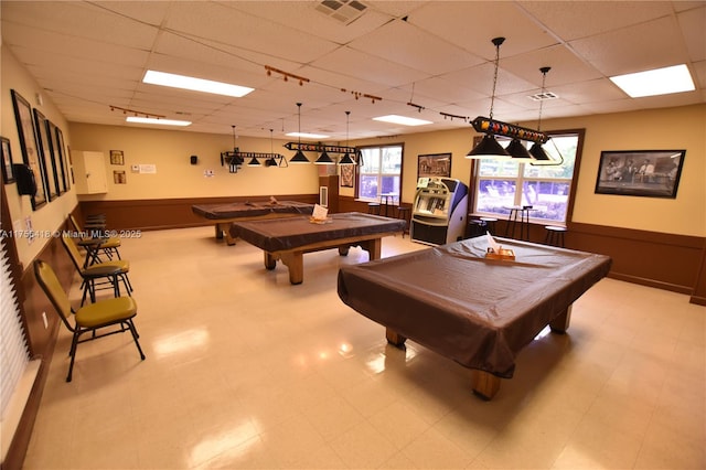 recreation room featuring pool table, wainscoting, a drop ceiling, and visible vents