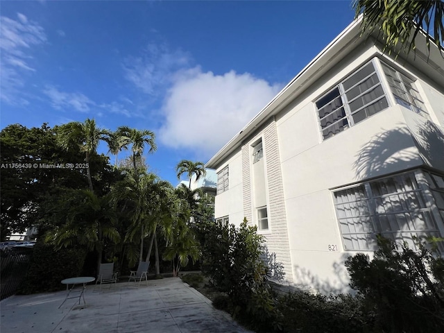 view of home's exterior featuring a patio area and stucco siding