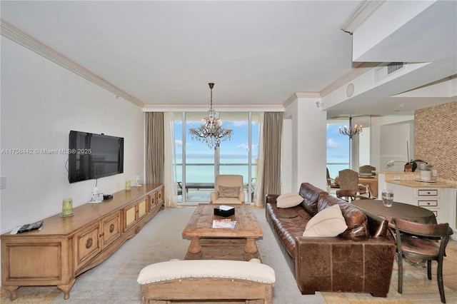 living area featuring crown molding, a wall of windows, and a notable chandelier