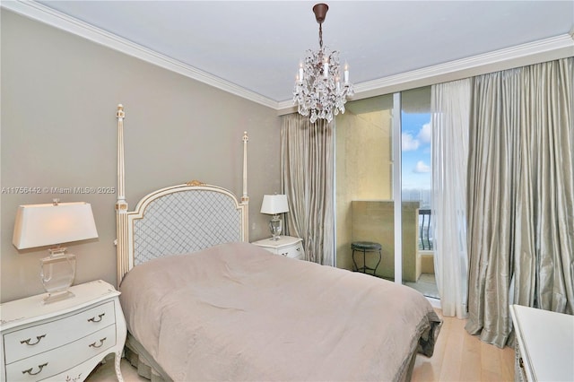 bedroom featuring access to exterior, light wood-style flooring, crown molding, and an inviting chandelier