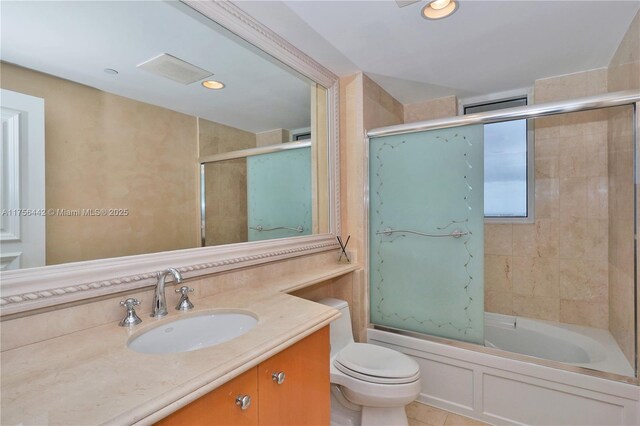 full bath with toilet, tile patterned flooring, combined bath / shower with glass door, vanity, and recessed lighting