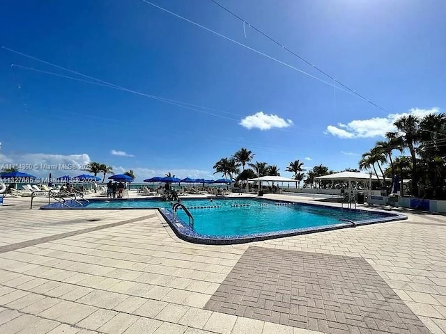 community pool featuring a patio