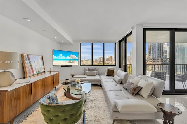 living room featuring recessed lighting and plenty of natural light