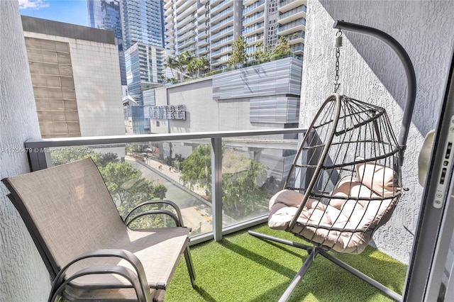 balcony featuring a view of city