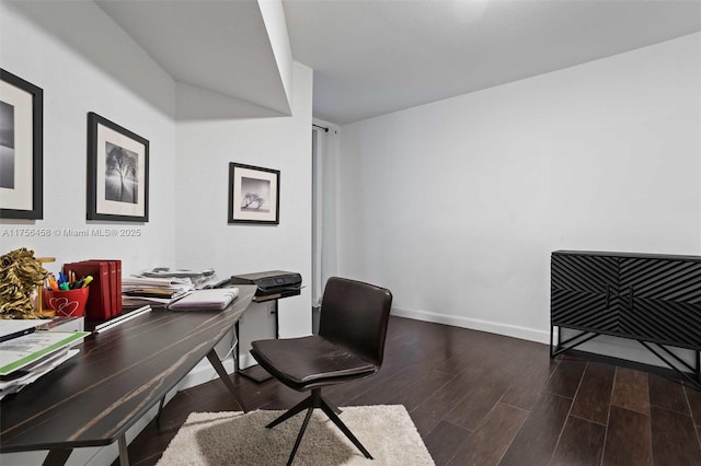 office featuring baseboards and dark wood-type flooring