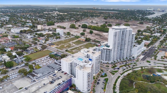 aerial view with a city view and a water view