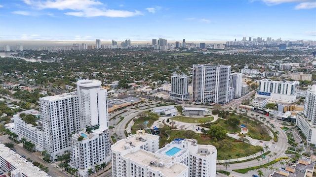 drone / aerial view featuring a city view