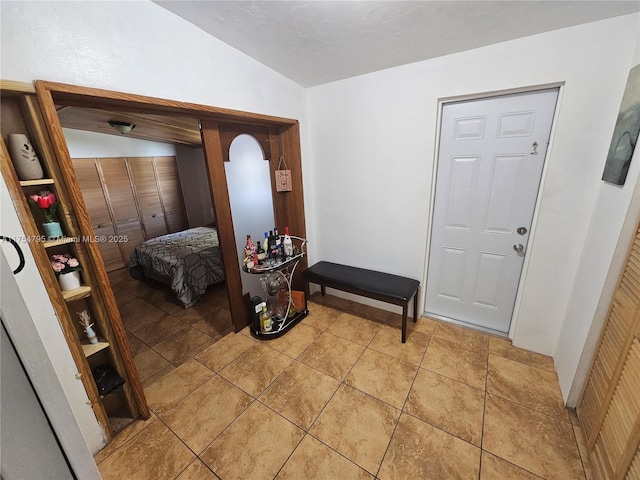 foyer with light tile patterned flooring