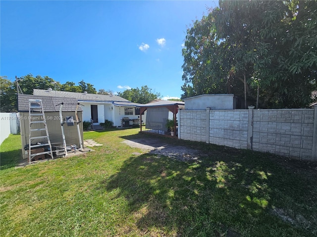 view of yard featuring fence