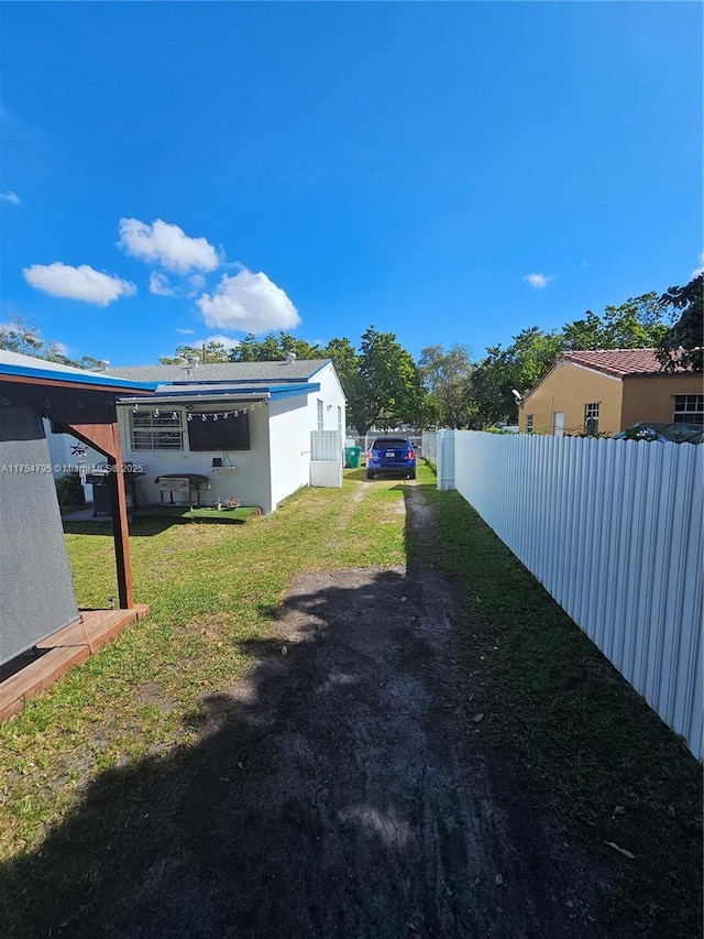 view of yard with fence