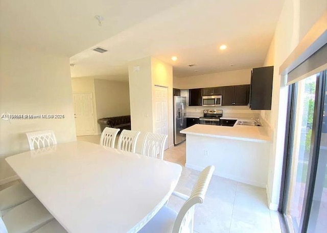 dining space with visible vents and recessed lighting