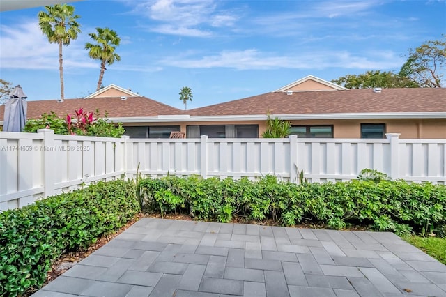 view of patio with fence