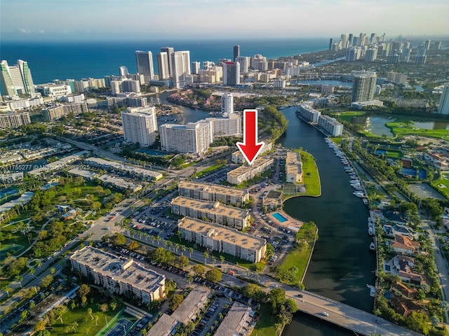 aerial view with a water view and a city view