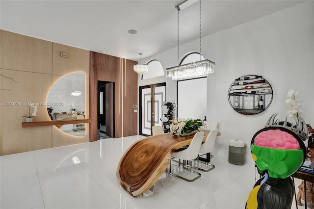 interior space with pendant lighting and tile patterned floors