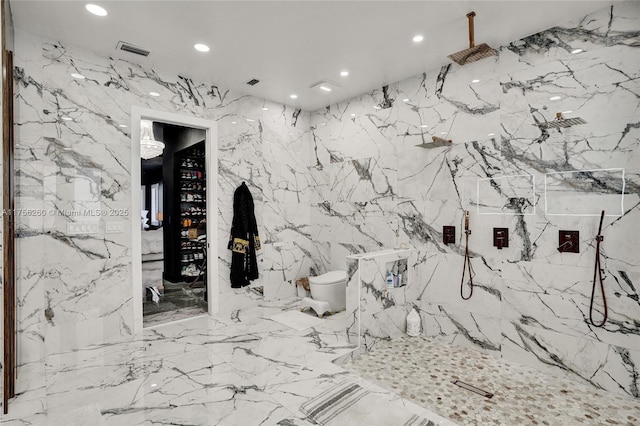 interior space with recessed lighting, a marble finish shower, visible vents, and toilet