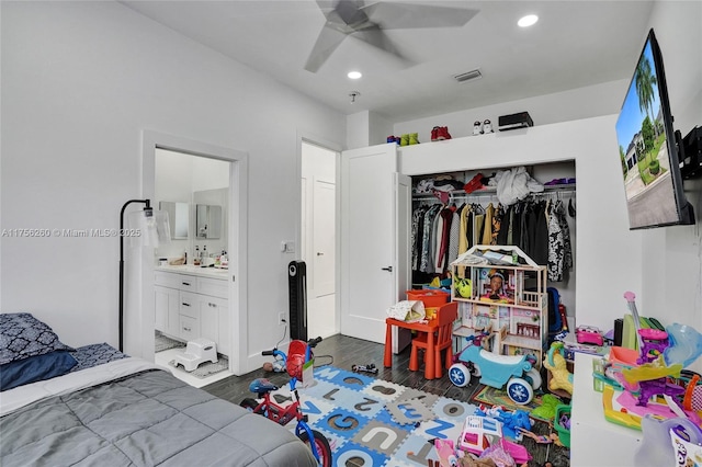 bedroom featuring recessed lighting, a ceiling fan, visible vents, a closet, and dark wood-style floors