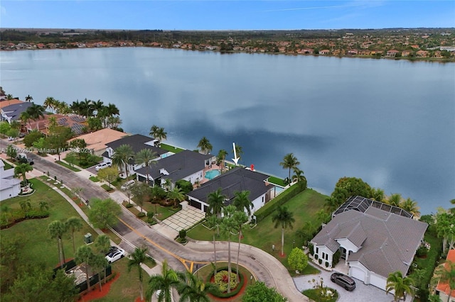 aerial view featuring a water view and a residential view