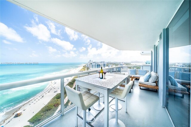 6301 Collins Ave Unit 2802, Miami Beach, FL 33141 - living area with expansive windows, a water view, and light tile patterned flooring