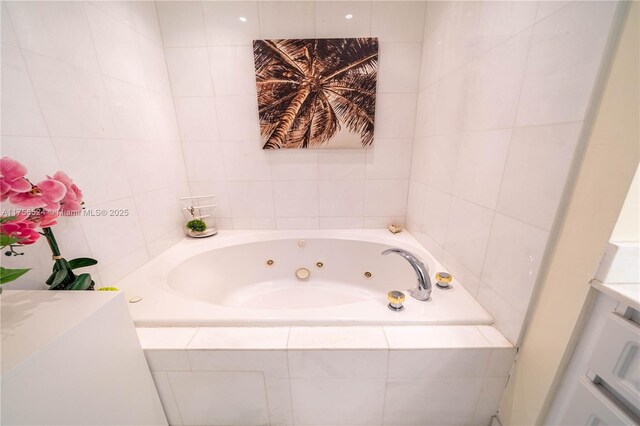 6301 Collins Ave Unit 2802, Miami Beach, FL 33141 - full bath with a tub with jets, double vanity, recessed lighting, and tile patterned floors