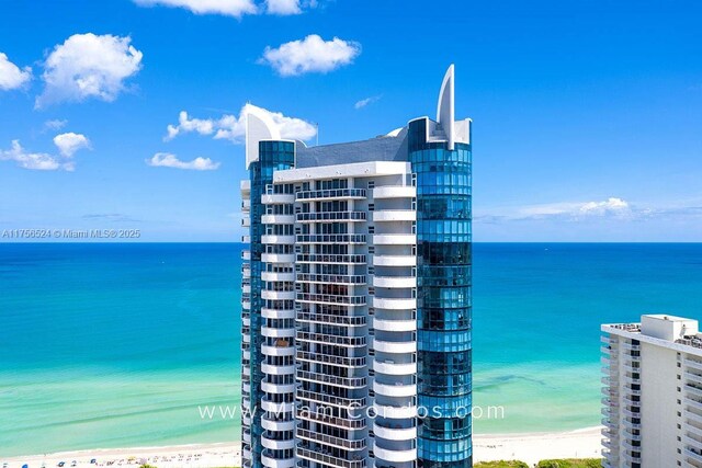 6301 Collins Ave Unit 2802, Miami Beach, FL 33141 - bathroom with a bidet, a stall shower, toilet, tile patterned floors, and vanity