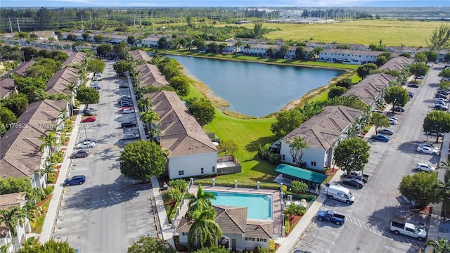 aerial view with a residential view and a water view