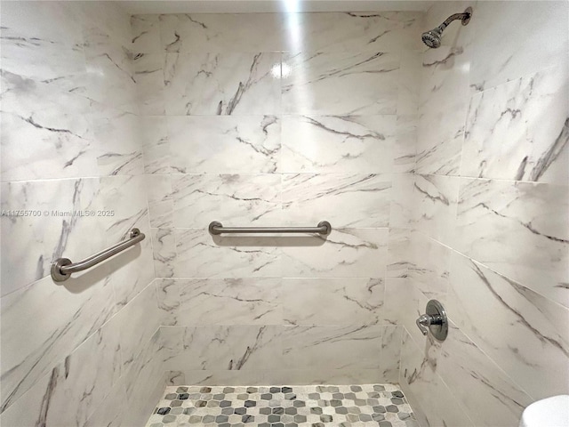 bathroom featuring a shower