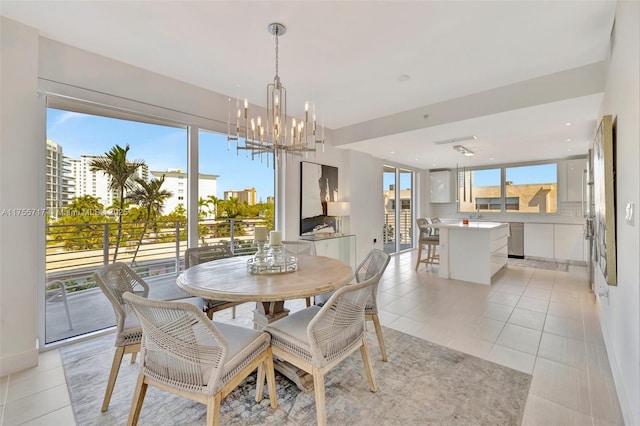 dining room featuring light tile patterned floors, baseboards, a chandelier, and recessed lighting