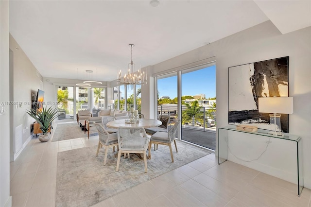 dining area with light tile patterned floors, visible vents, and a notable chandelier