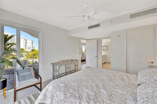 tiled bedroom with access to outside, connected bathroom, visible vents, and a ceiling fan