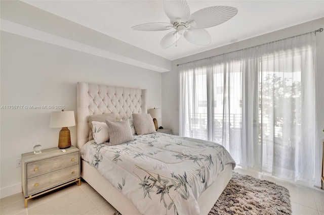 bedroom featuring light tile patterned floors and ceiling fan