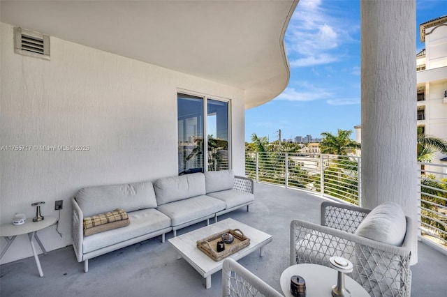 balcony with outdoor lounge area and visible vents