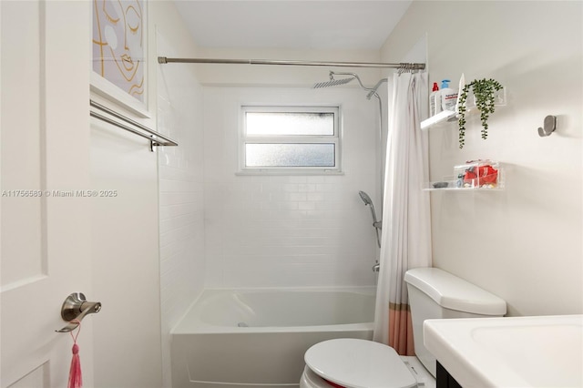 full bathroom with shower / tub combo, vanity, and toilet