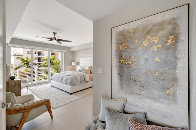 bedroom featuring access to outside and ceiling fan