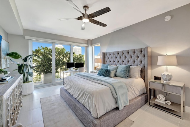 bedroom featuring light tile patterned floors and a ceiling fan