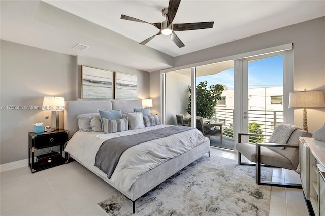 bedroom with access to exterior, baseboards, a ceiling fan, and visible vents
