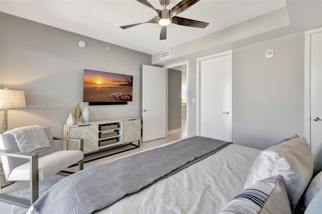 bedroom featuring visible vents and ceiling fan