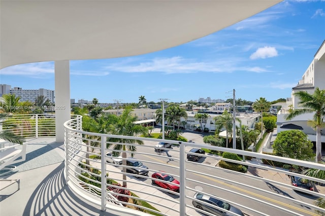 balcony featuring a city view