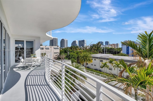 balcony featuring a view of city