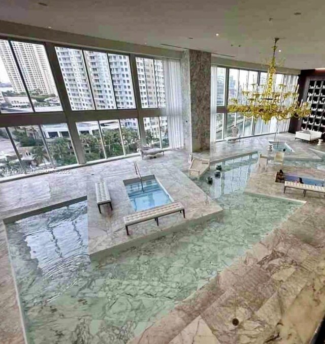 475 Brickell Ave Unit 4107, Miami, FL 33131 - view of swimming pool with a notable chandelier